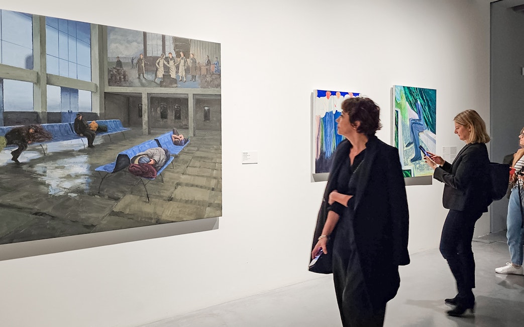 Visitors viewing paintings at Picasso's Birthplace Museum.