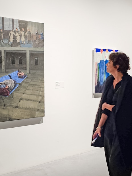 Visitors viewing paintings at Picasso's Birthplace Museum.