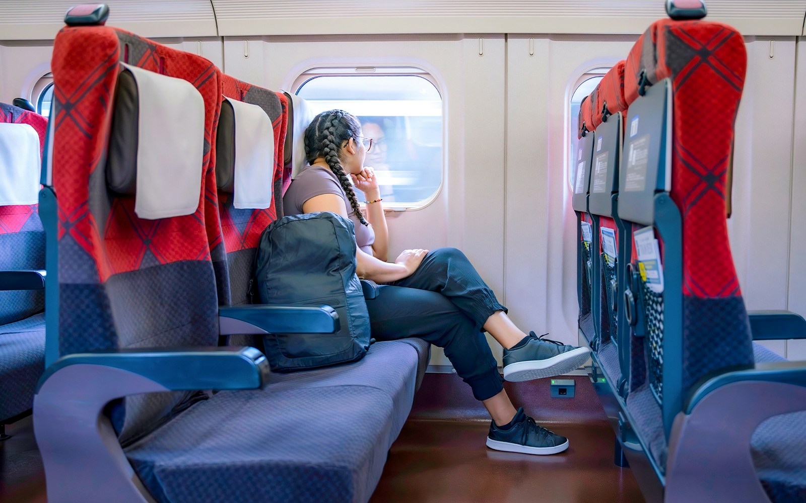 Girl on bullet train, Japan