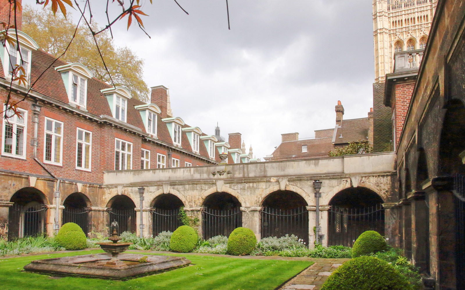 Courtyard with arches and fountain at Westminster Abbey, London.