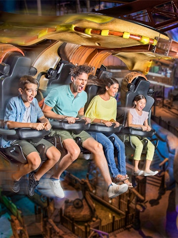 Roller coaster at Motiongate Dubai in Dubai Parks and Resorts, featuring thrilling loops and vibrant surroundings.