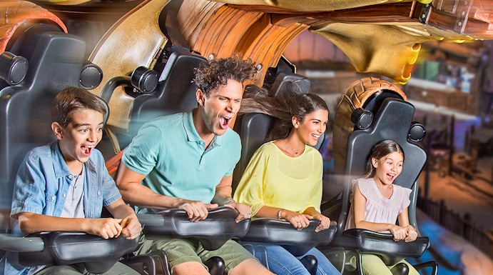 Roller coaster at Motiongate Dubai in Dubai Parks and Resorts, featuring thrilling loops and vibrant surroundings.