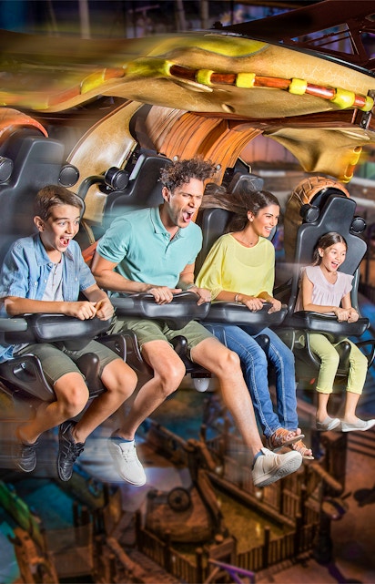 Roller coaster at Motiongate Dubai in Dubai Parks and Resorts, featuring thrilling loops and vibrant surroundings.