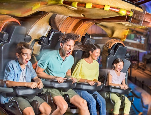 Roller coaster at Motiongate Dubai in Dubai Parks and Resorts, featuring thrilling loops and vibrant surroundings.