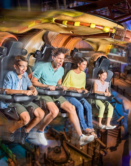 Roller coaster at Motiongate Dubai in Dubai Parks and Resorts, featuring thrilling loops and vibrant surroundings.