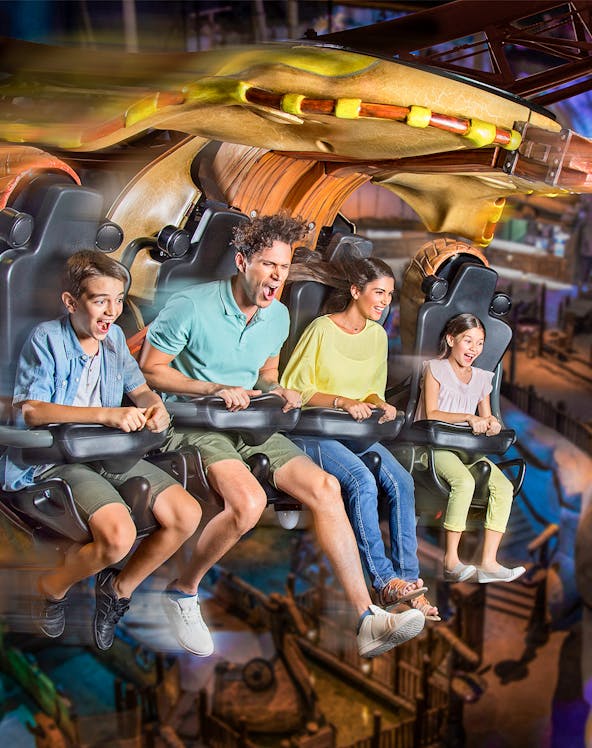 Roller coaster at Motiongate Dubai in Dubai Parks and Resorts, featuring thrilling loops and vibrant surroundings.