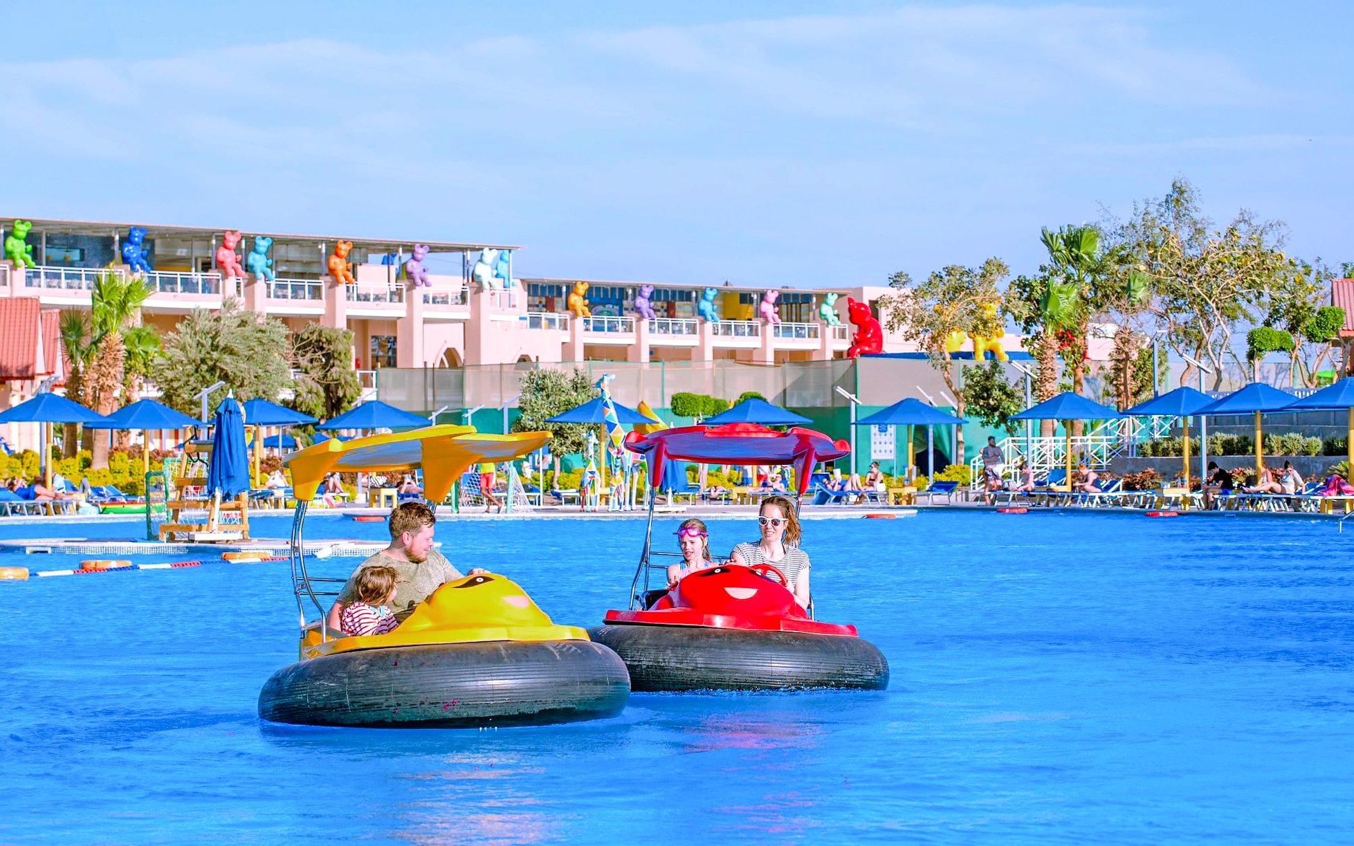 Family enjoying bump boat ride at Neverland Waterpark, Pickalbatros, Hurghada.