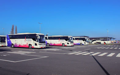 Aerobus buses parked at Paris Beauvais Airport for transfers to Saint-Denis University.