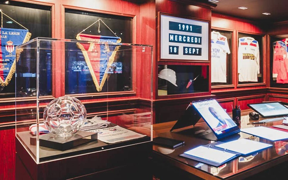 Olympique Lyonnais museum display with jerseys and memorabilia, Lyon, France.