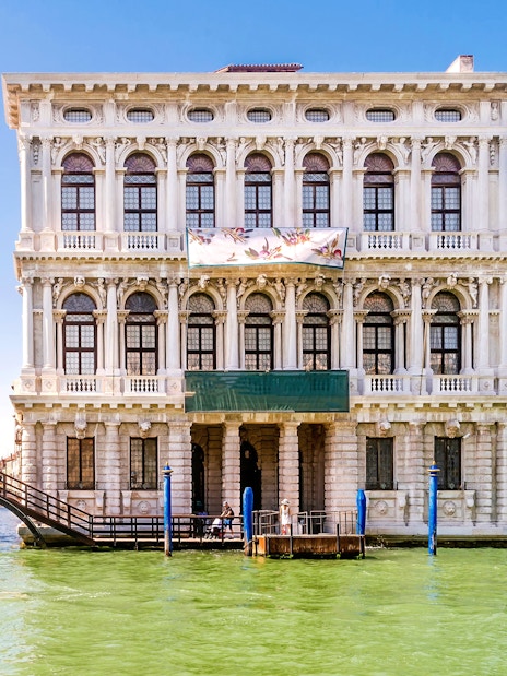 Ca Rezzonico facade along the Grand Canal in Venice, Italy.