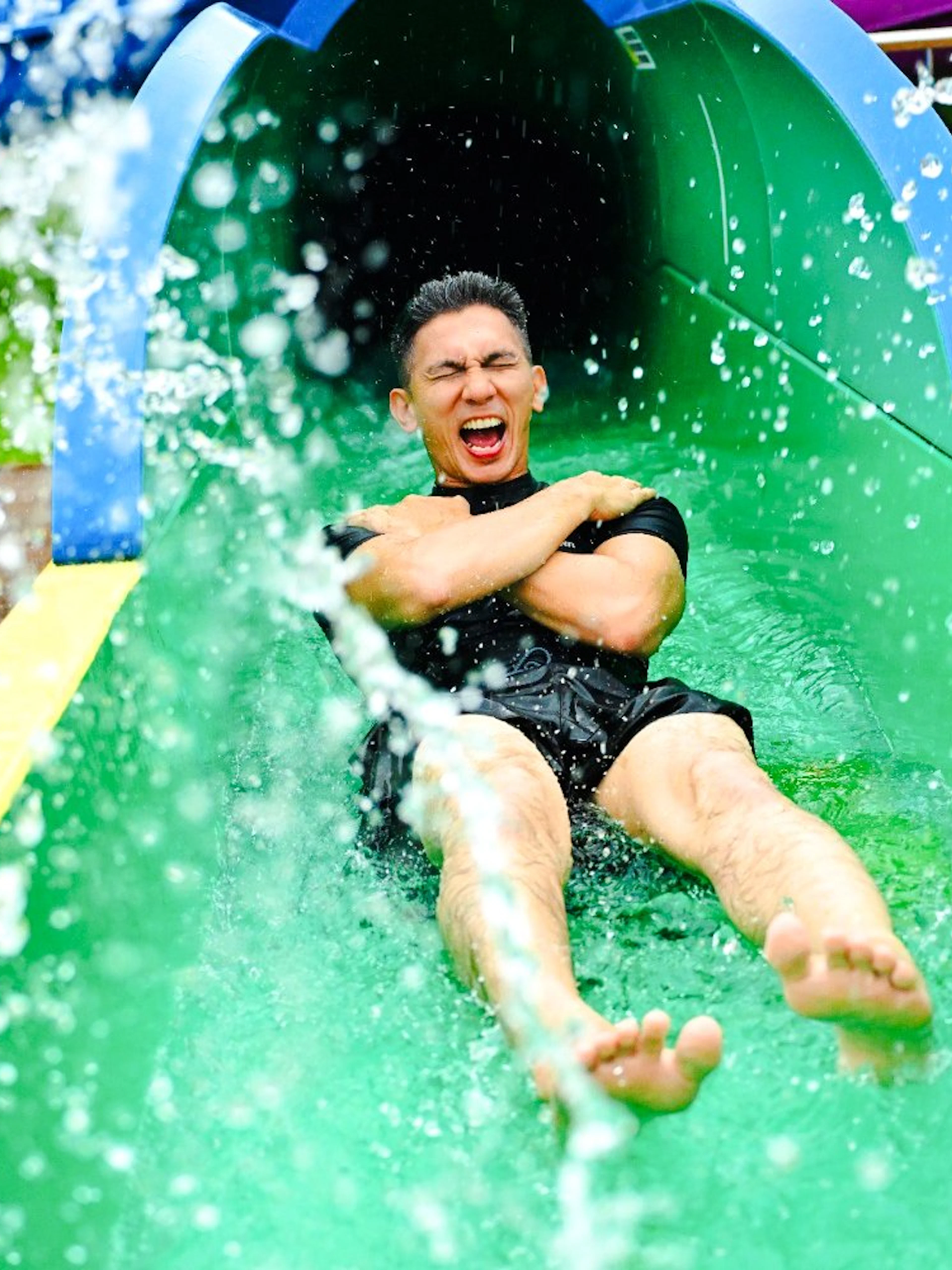 Tourist on a water slide at Legoland Malaysia.