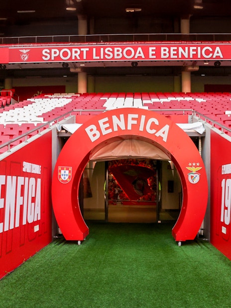 Benfica Stadium player entrance with red and white seating in Lisbon, Portugal.