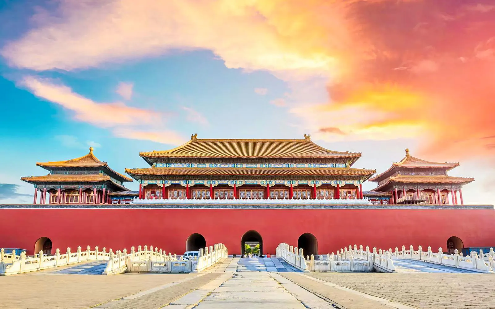 Meridian Gate, main entrance to the Forbidden City, Beijing, under a vibrant sky.