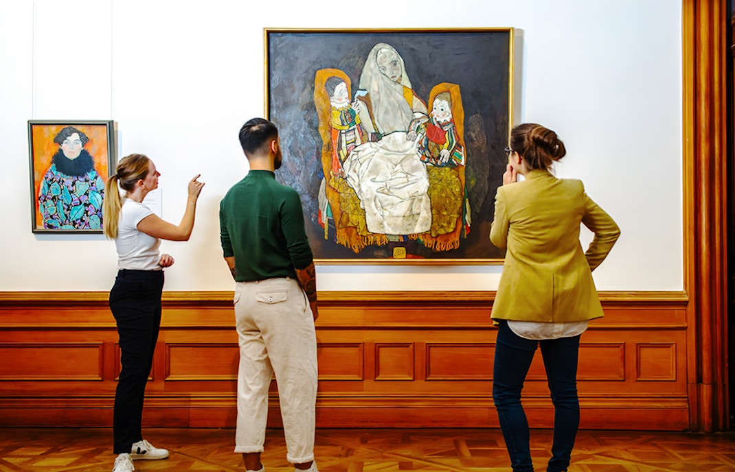 Visitors observing contemporary art