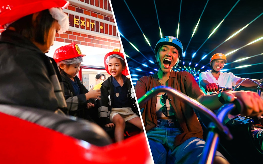 Children in firefighter uniforms role-playing at KidZania fire rescue.