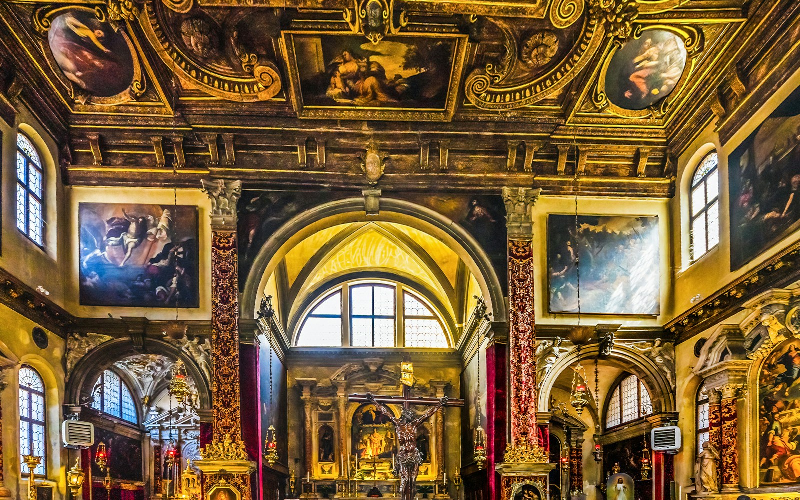 Church of San Zulian facade with intricate architectural details in Venice, Italy.