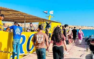 People boarding Royal Seascope Submarine in Hurghada, Egypt.