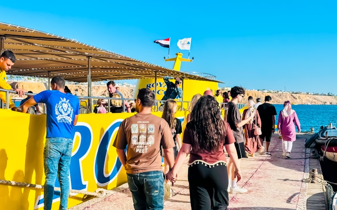 People boarding Royal Seascope Submarine in Hurghada, Egypt.