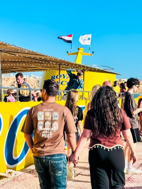 People boarding Royal Seascope Submarine in Hurghada, Egypt.