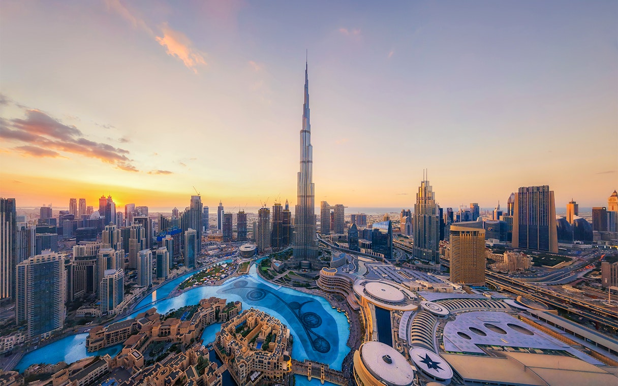 Skyline view of Dubai with Burj Khalifa at sunset, ideal for lunch with a view.