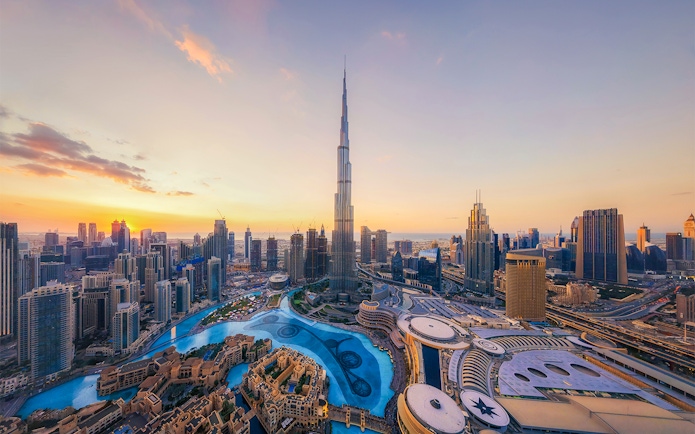 Skyline view of Dubai with Burj Khalifa at sunset, ideal for lunch with a view.