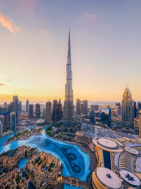 Skyline view of Dubai with Burj Khalifa at sunset, ideal for lunch with a view.