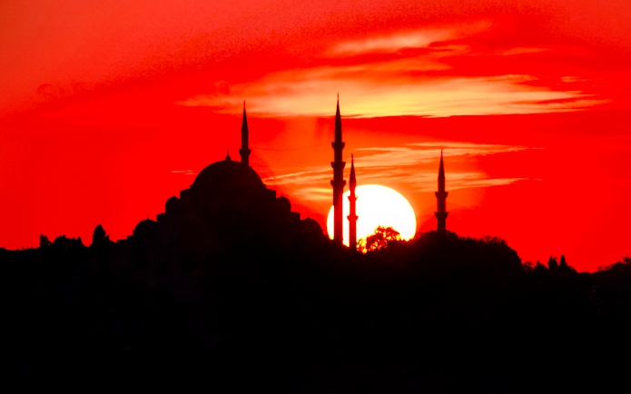 Sunset behind the Blue Mosque minarets in Istanbul.