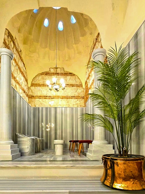 Gedikpasa Historical Hammam interior with marble columns and traditional decor.