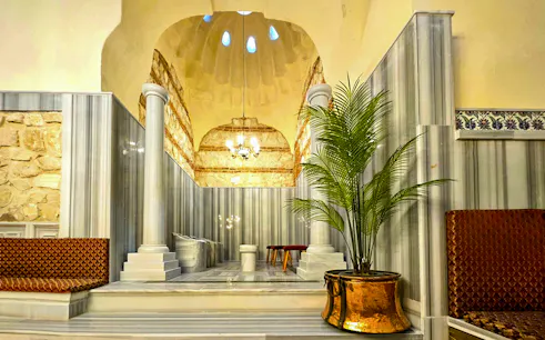 Gedikpasa Historical Hammam interior with marble columns and traditional decor.