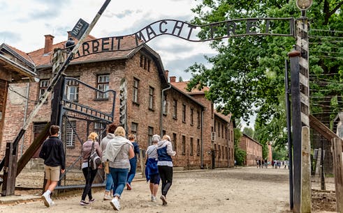Visitors inside the Auschwitz Concentration camp