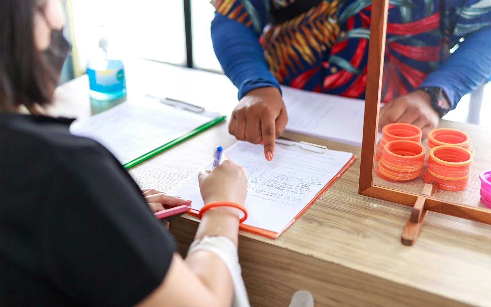 Tourist signing in for Similan Islands day tour from Phuket/Khaolak.