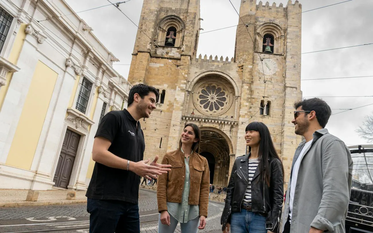 Tour group at Lisbon Cathedral during historic center walking tour.