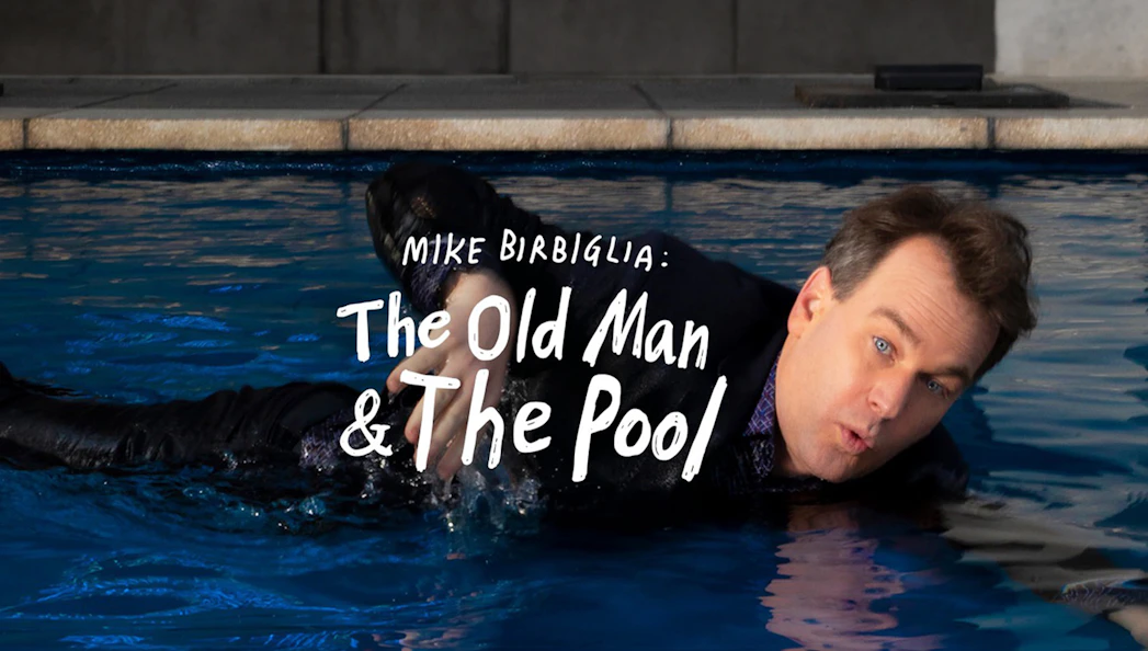 Man in a pool with text "The Old Man & the Pool" on the water surface.