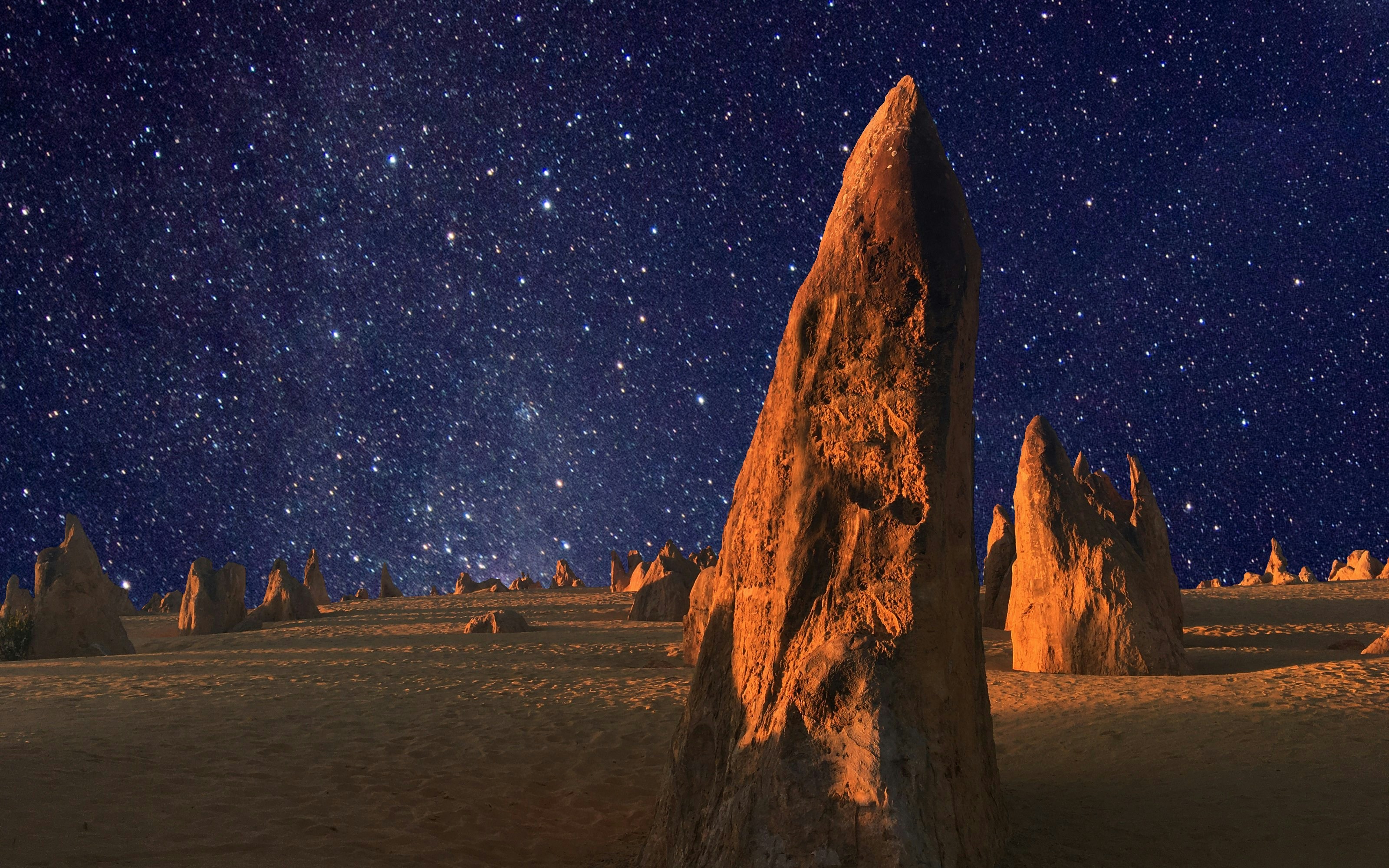 Stars over the landscape of the Pinnacle desert limestone formations at night