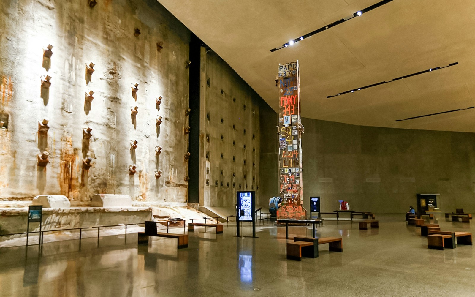 Visitors observing The Last Column at 9/11 Memorial Museum in New York City