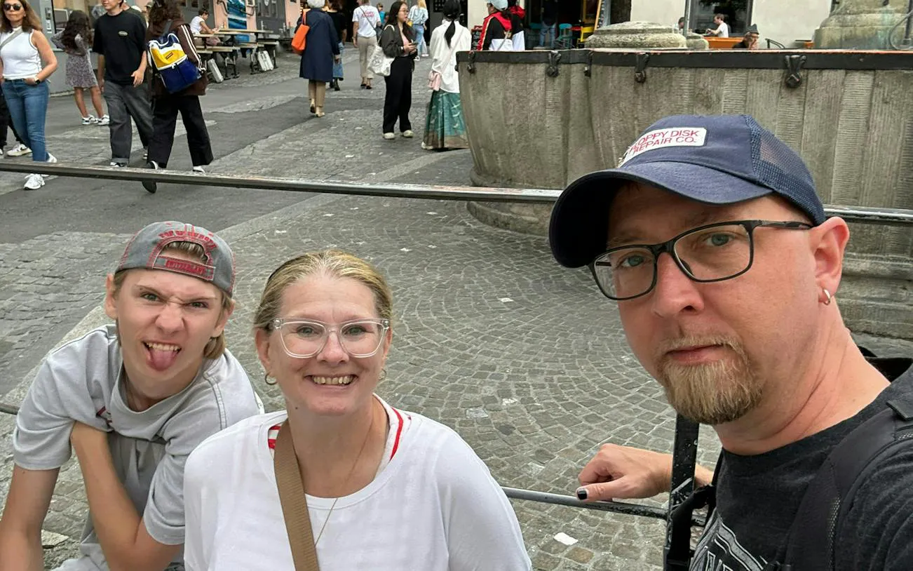 Group enjoying Zurich Murder Mystery city exploration game in Zurich street.