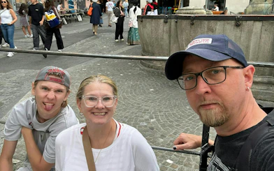Group enjoying Zurich Murder Mystery city exploration game in Zurich street.