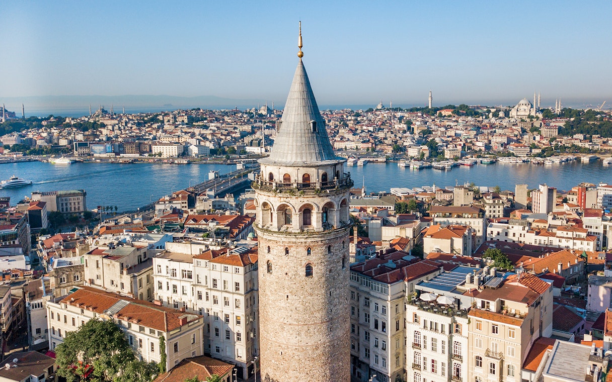 Galata Tower overlooking Istanbul cityscape and Bosphorus.