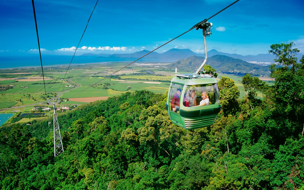 Kuranda Skyrail gliding over tropical rainforest in Cairns, Australia.