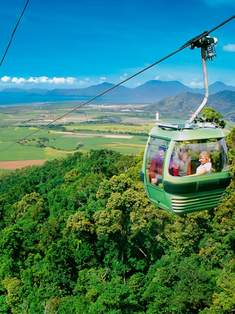 Kuranda Skyrail gliding over tropical rainforest in Cairns, Australia.