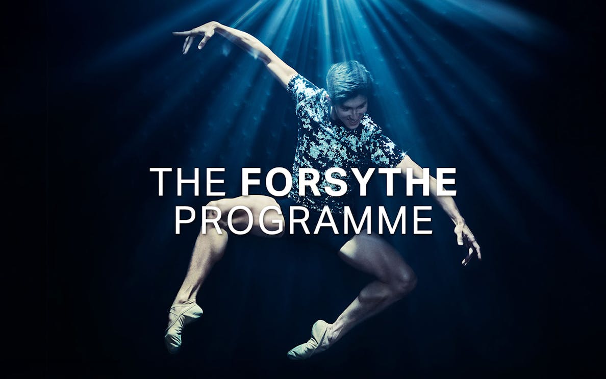 Dancer performing under spotlight for The Forsythe Programme.