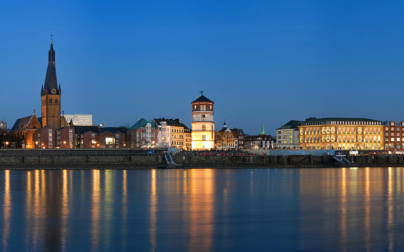 View of the Dusseldorf Old Town during Evening Panorama Cruise Tour