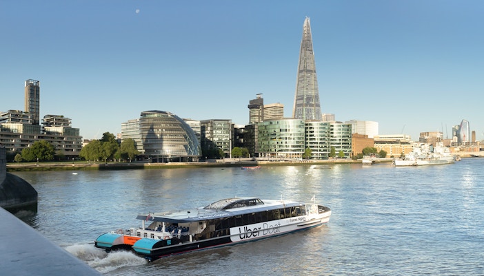 Uber Boat by Thames Clippers on the River Thames with London skyline.