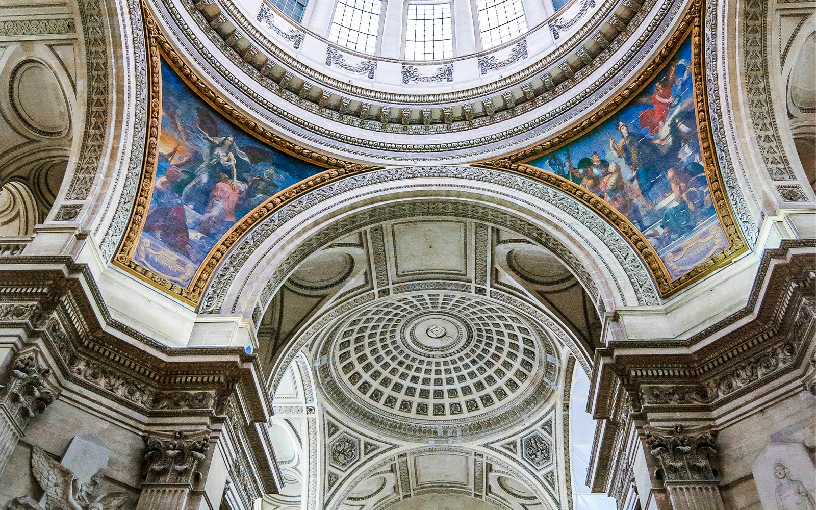 Pantheon frescoes depicting historical figures in Paris, France.