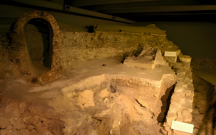Notre-Dame Archaeological Crypt ancient stone ruins and archway.