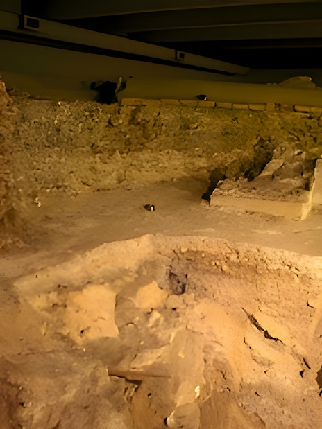 Notre-Dame Archaeological Crypt ancient stone ruins and archway.