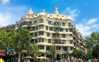 Casa Mila in Barcelona with unique stone facade and wrought iron balconies.