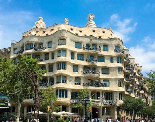Casa Mila in Barcelona with unique stone facade and wrought iron balconies.