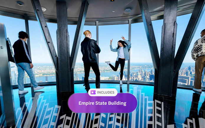Guests on the 102nd floor of the Empire State Building enjoying New York City views.