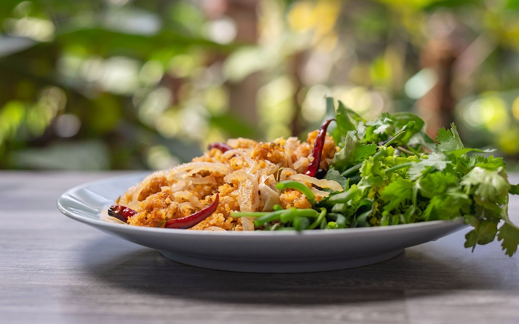 Shredded salted pork with vegetables on a dish, Thai cuisine.